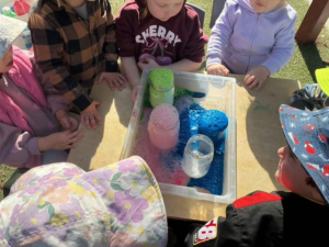 Children participating in sensory play activities at Jacaranda Childcare Centre with hands-on learning experiences