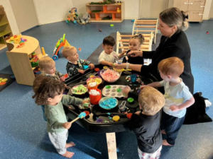 Children participating in sensory play activities at Jacaranda Childcare Centre with hands-on learning experiences